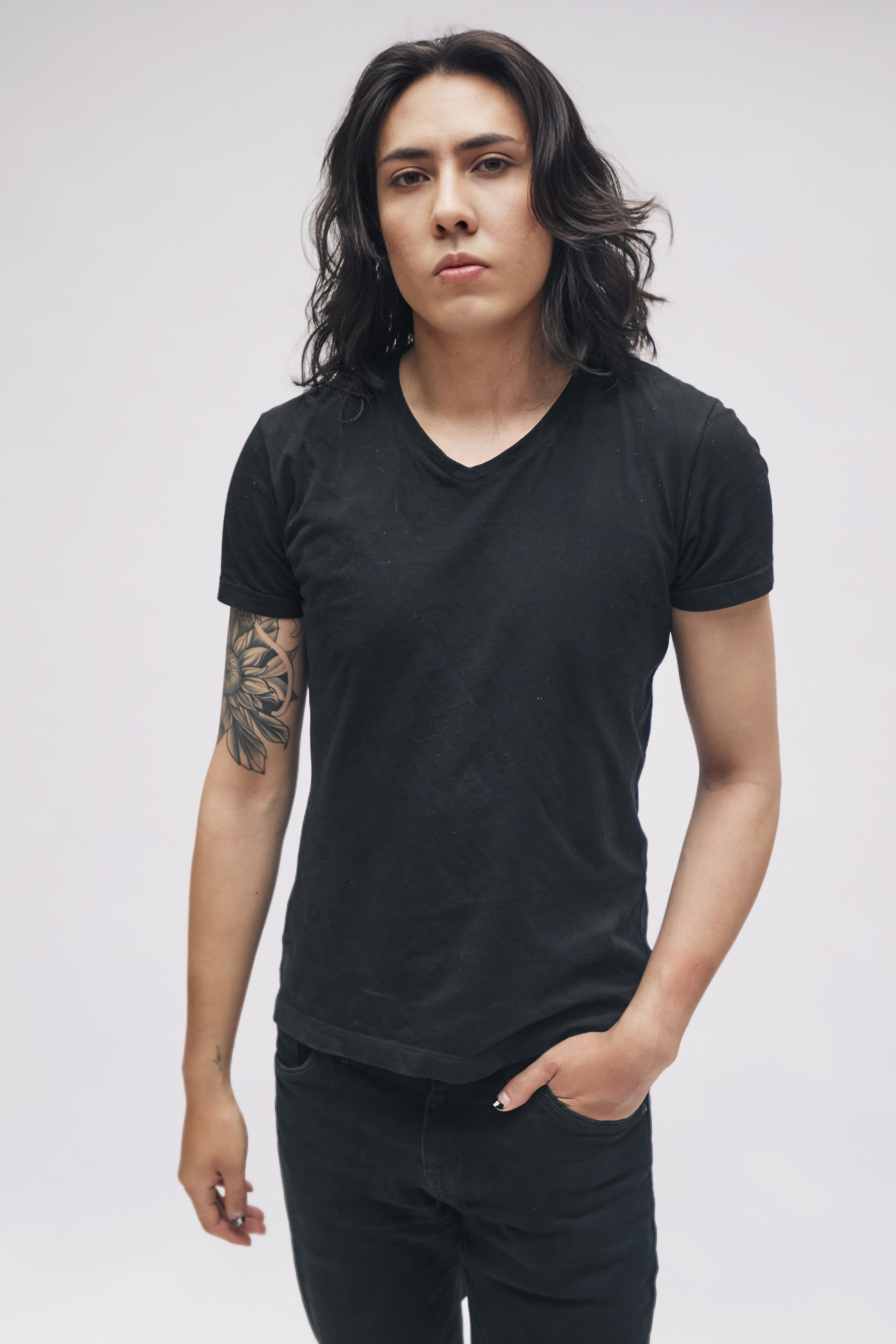 ohan Peraza, studio digitals portrait for casting showcasing a black v-neck t-shirt